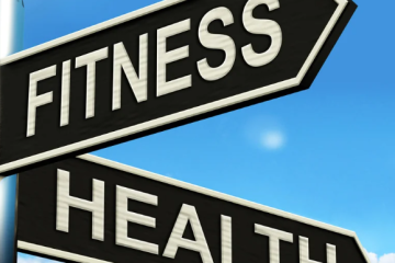 Two street signs with fitness and health.